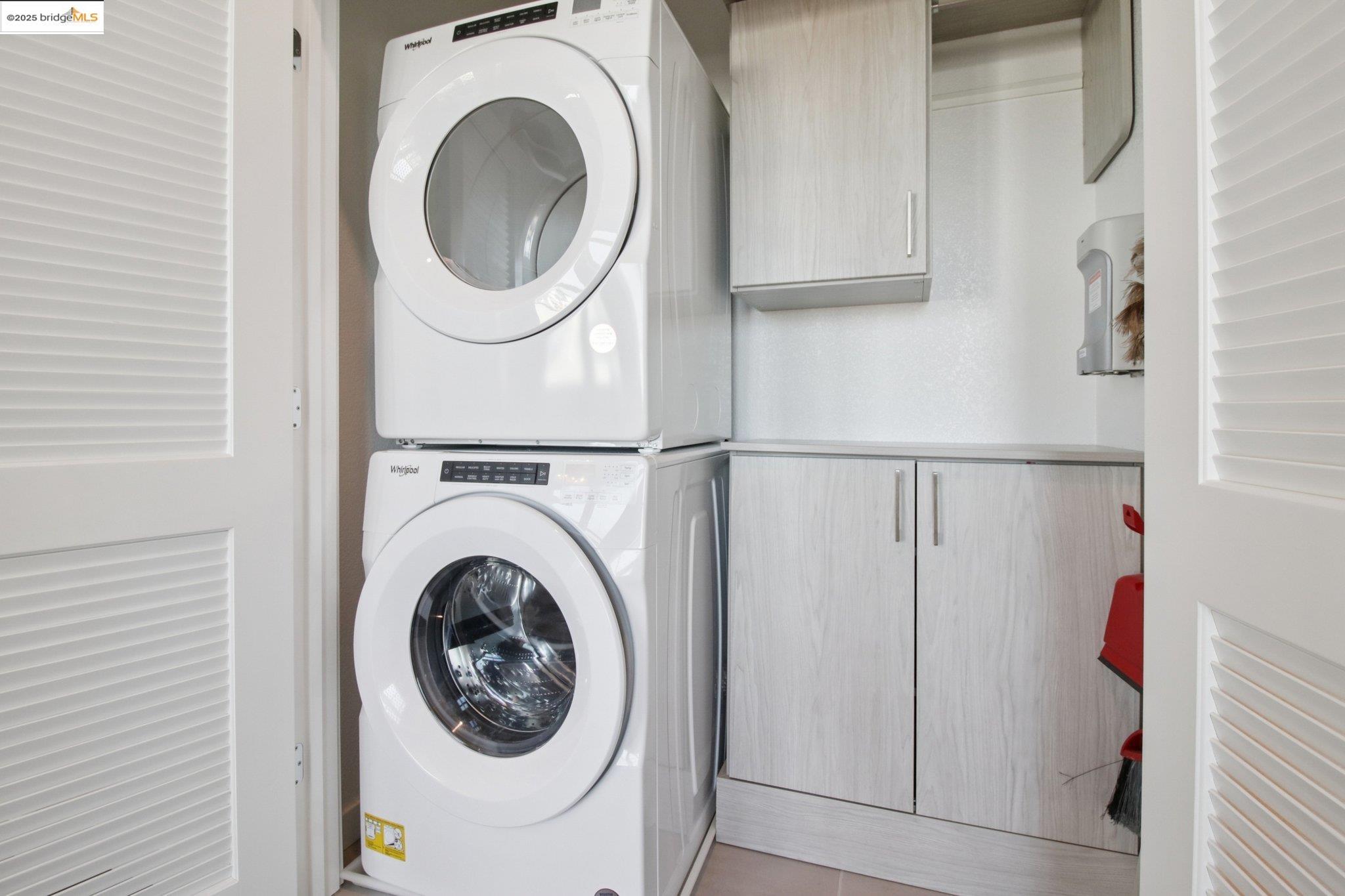 2878 5th Street Alameda, CA 94501 - Photo 19 of 56 a close up view of a washer and dryer