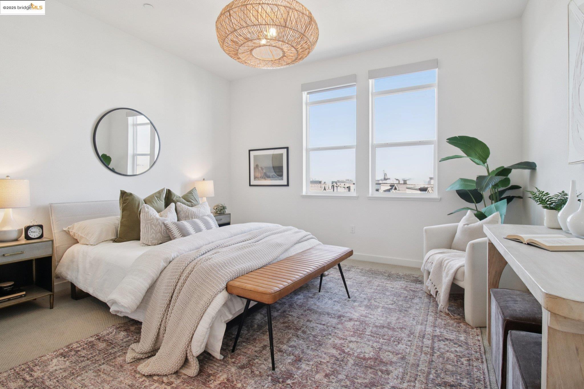 2878 5th Street Alameda, CA 94501 - Photo 20 of 56 a bedroom with a bed and a chandelier