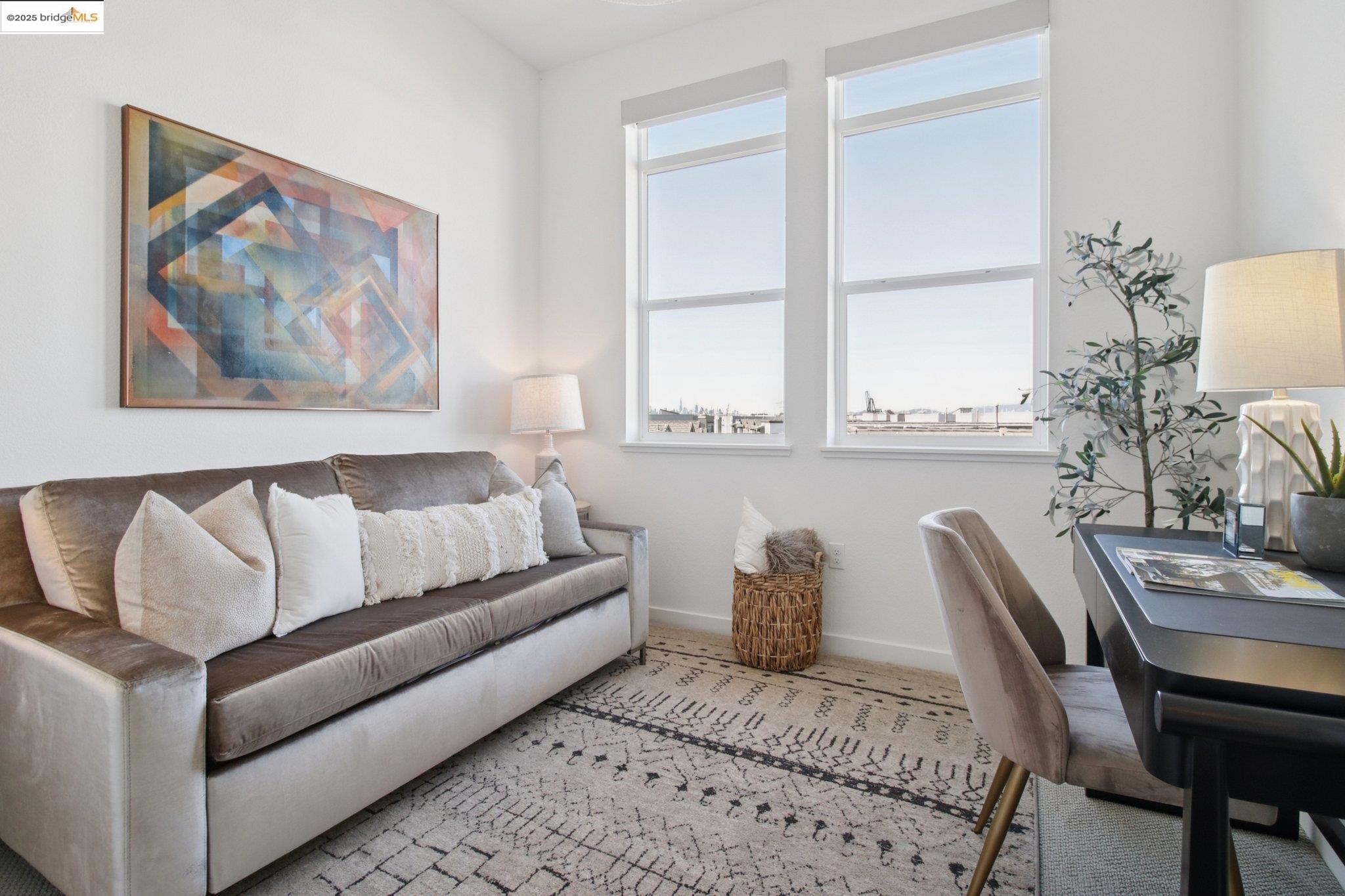 2878 5th Street Alameda, CA 94501 - Photo 26 of 56 a living room with furniture and a large window