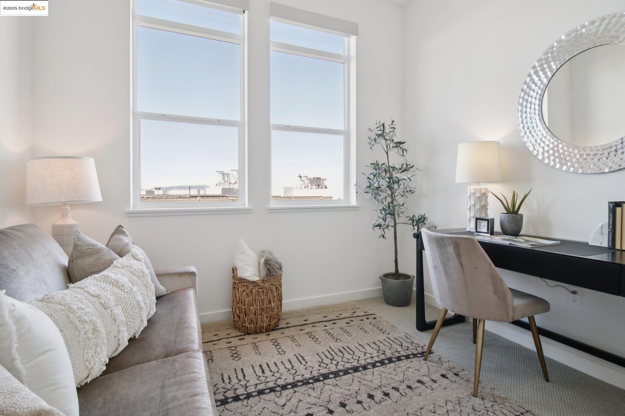 2878 5th Street Alameda, CA 94501 - Photo 27 of 56 a living room with furniture and a window