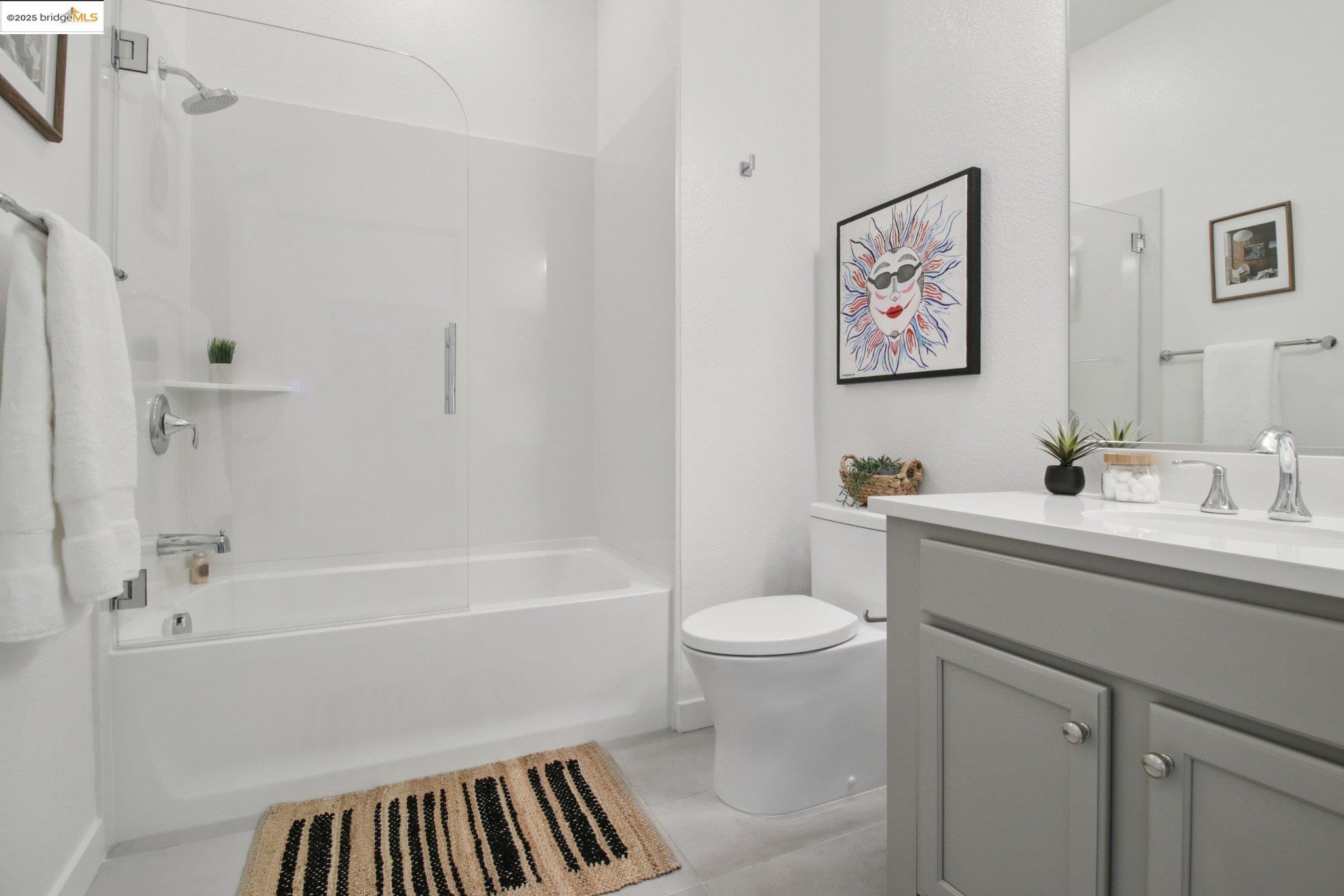 2878 5th Street Alameda, CA 94501 - Photo 28 of 56 a bathroom with a sink toilet and a bathtub