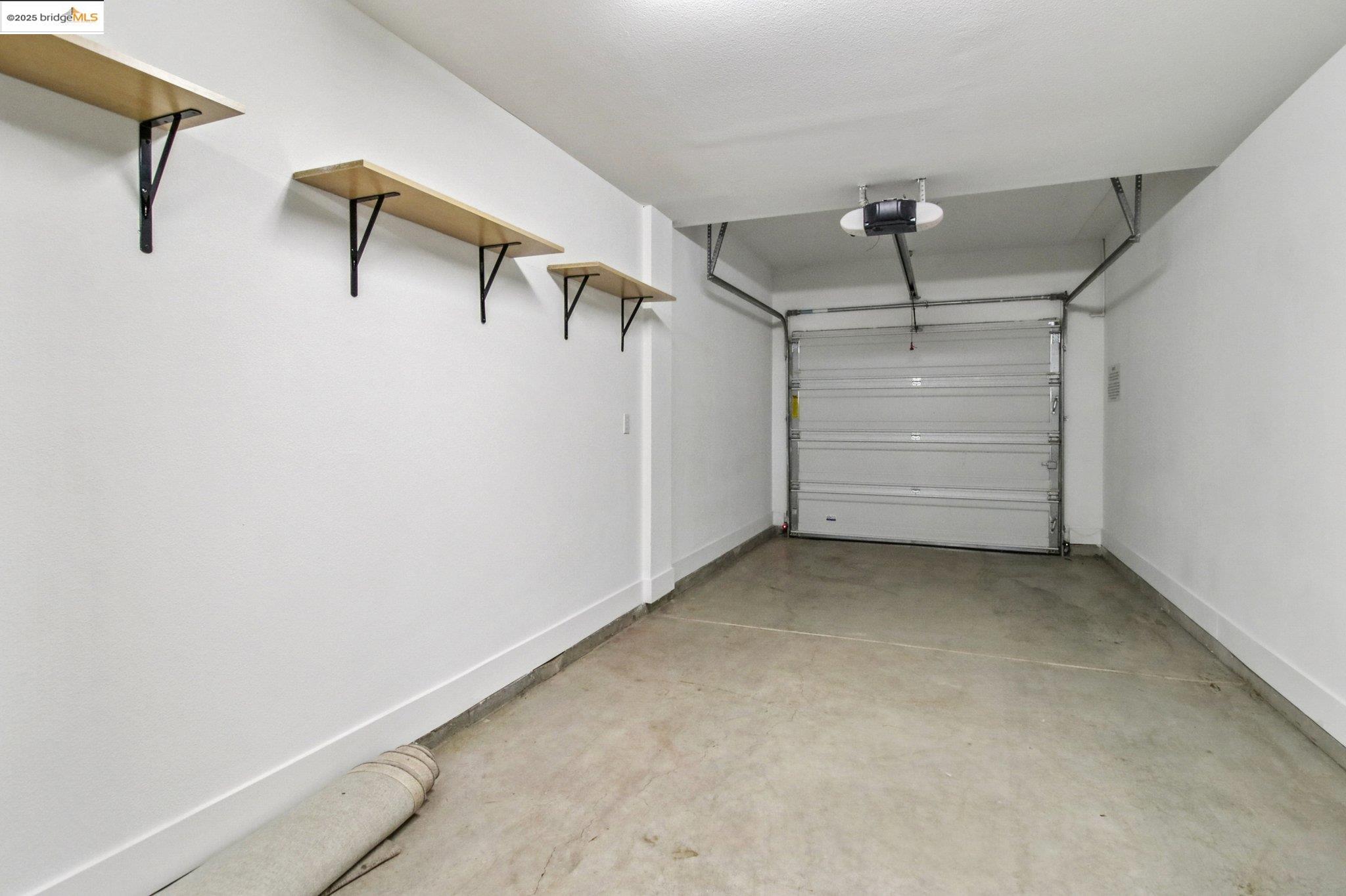 2878 5th Street Alameda, CA 94501 - Photo 29 of 56 a view of a room with racks on the wall