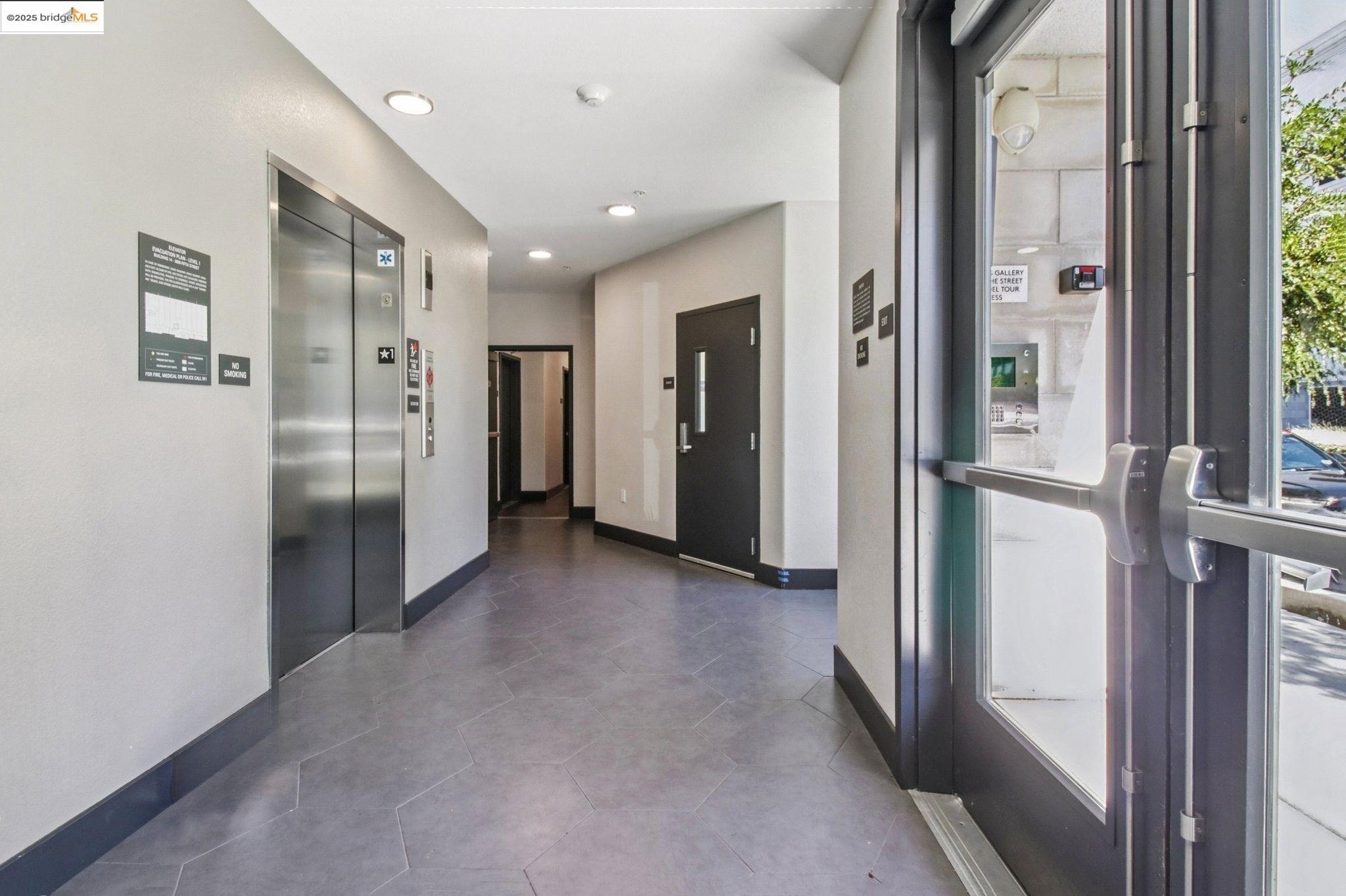 2878 5th Street Alameda, CA 94501 - Photo 31 of 56 a view of a hallway with wooden shelves