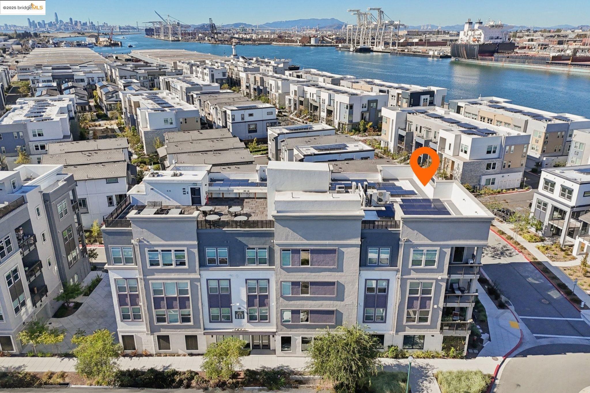 2878 5th Street Alameda, CA 94501 - Photo 45 of 56 a view of a building with a lot of windows