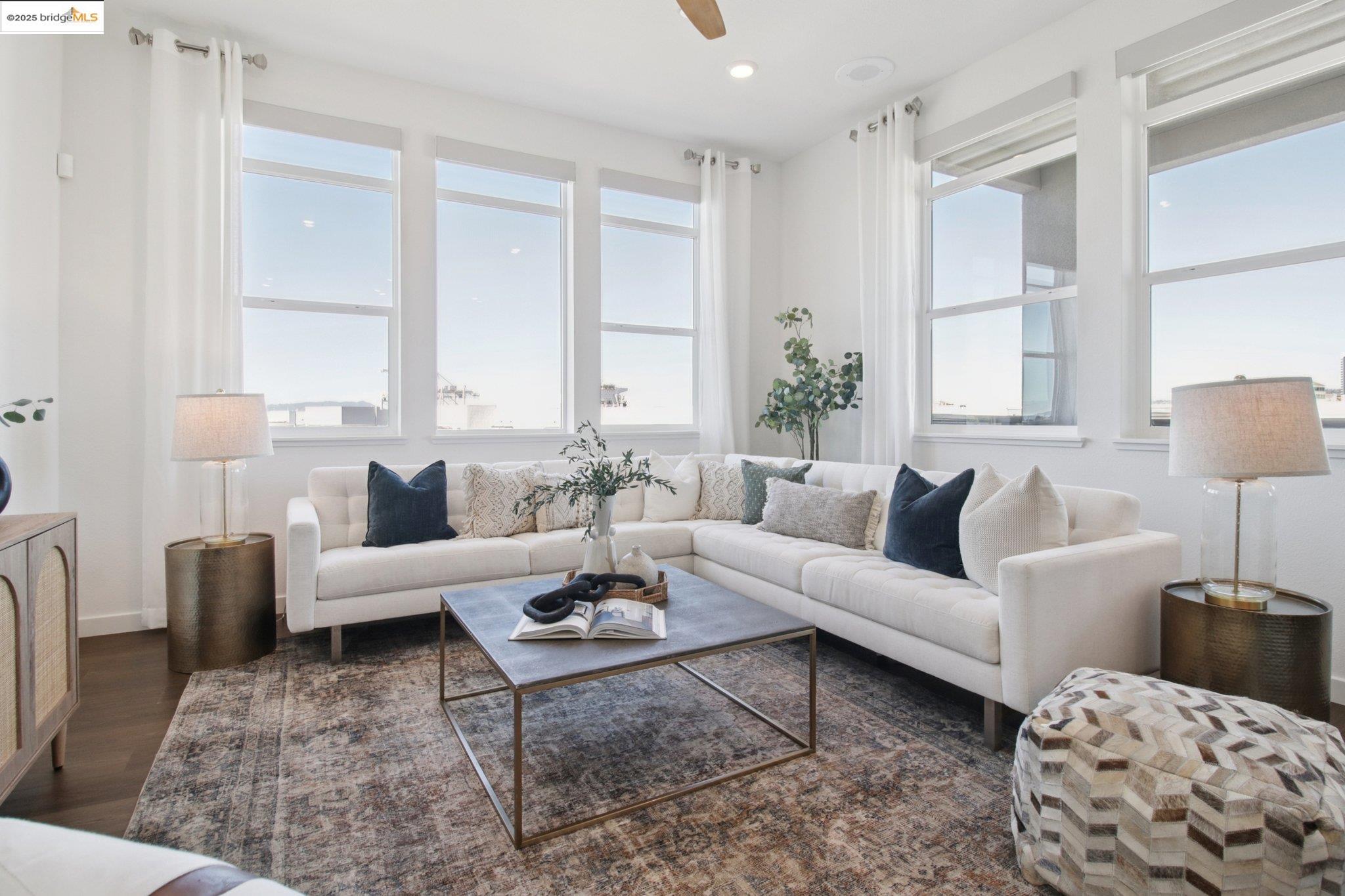 2878 5th Street Alameda, CA 94501 - Photo 5 of 56 a living room with furniture or couch and a large window
