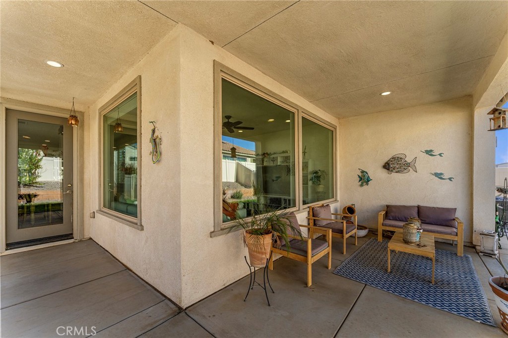 1656 Spring Run Lane Beaumont, CA 92223 - Photo 29 of 40 a view of a livingroom with furniture and windows