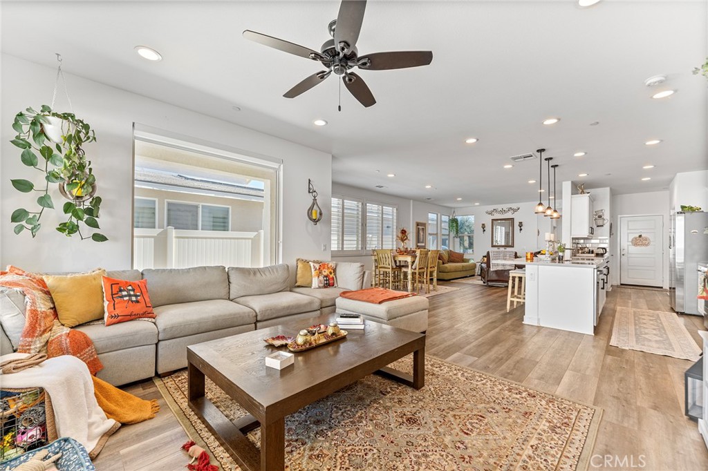 1656 Spring Run Lane Beaumont, CA 92223 - Photo 10 of 40 a living room with furniture and a large window