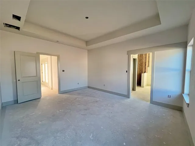 a view of an empty room and window