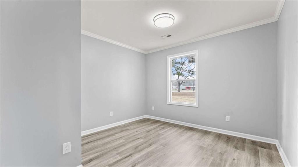 804 Blanche Road Cedartown, GA 30125 - Photo 12 of 24 an empty room with a window
