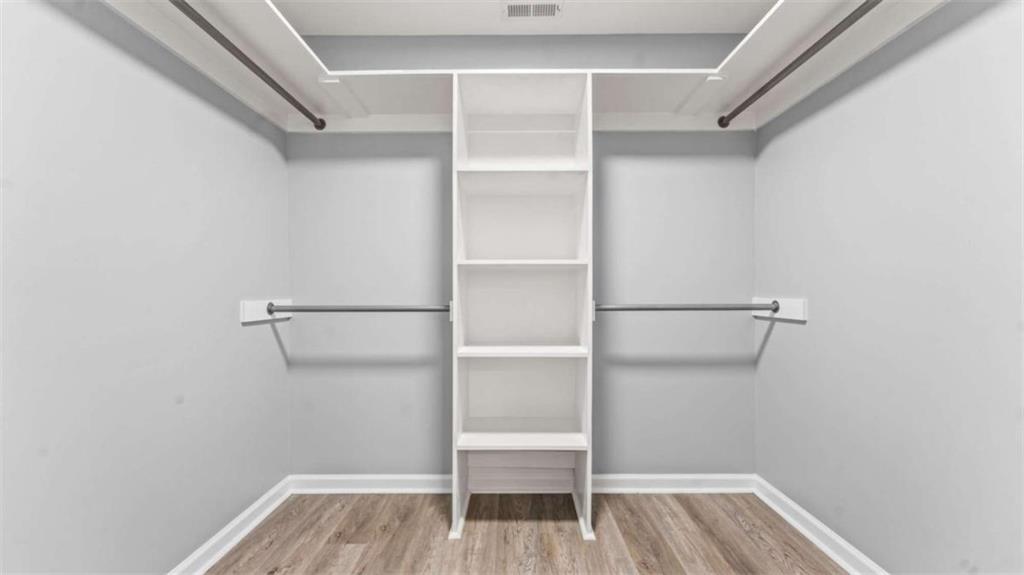 804 Blanche Road Cedartown, GA 30125 - Photo 19 of 24 a view of walk in closet with empty racks