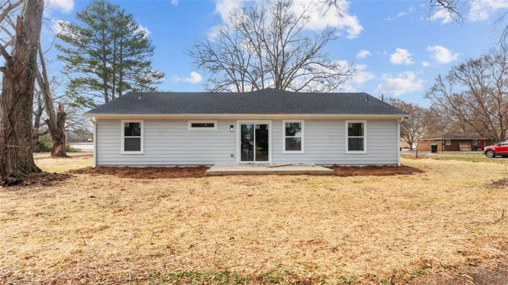 804 Blanche Road Cedartown, GA 30125 - Photo 23 of 24 a backyard of a house with large tree