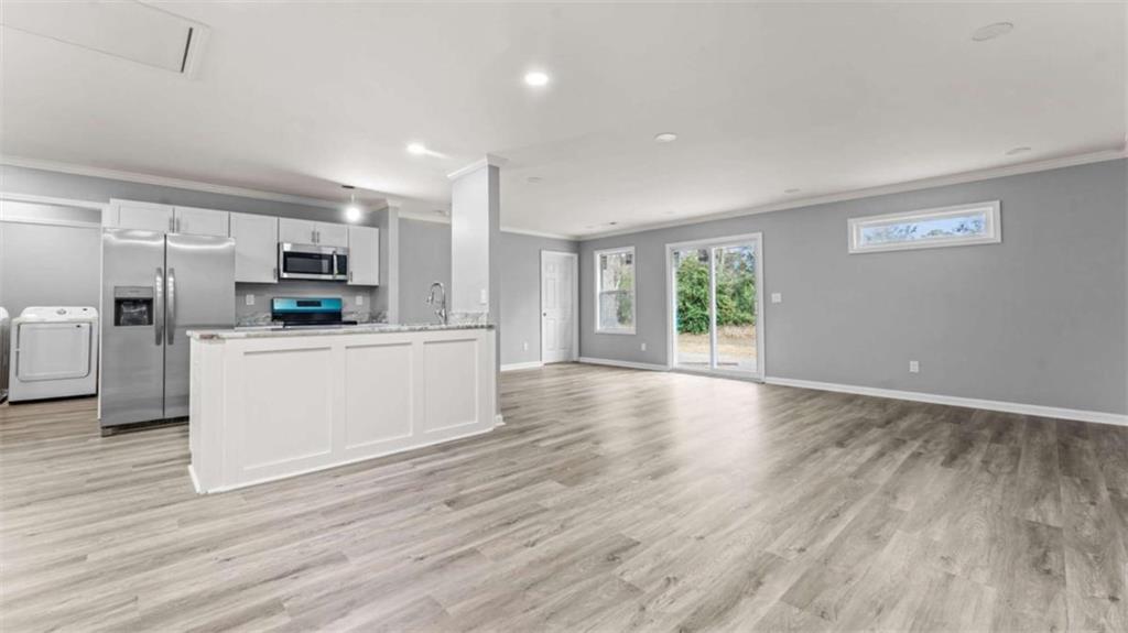 804 Blanche Road Cedartown, GA 30125 - Photo 8 of 24 a view of a kitchen with microwave and refrigerator