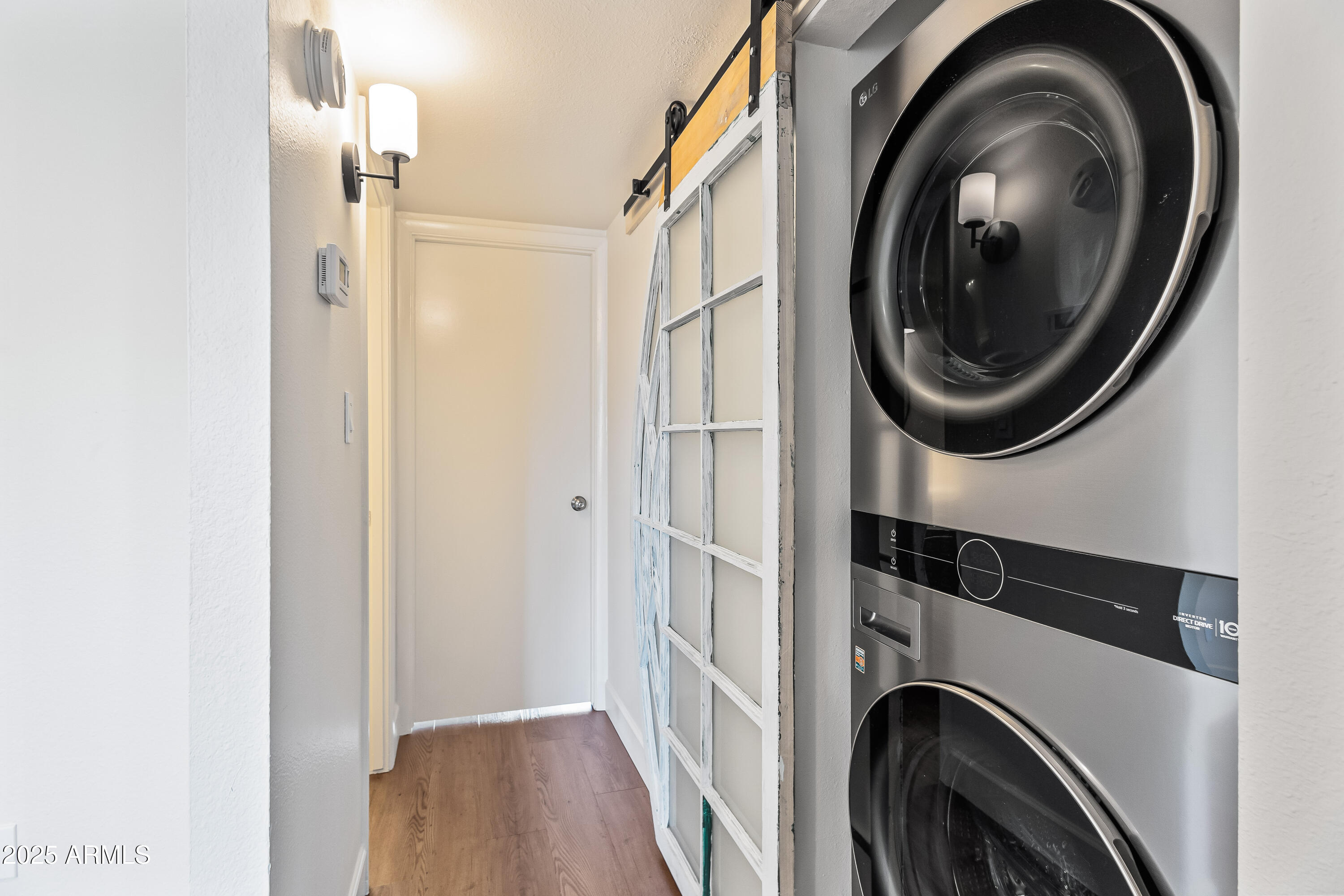 4201 East Camelback Road, Unit 100 Phoenix, AZ 85018 - Photo 15 of 24 Closet | Laundry