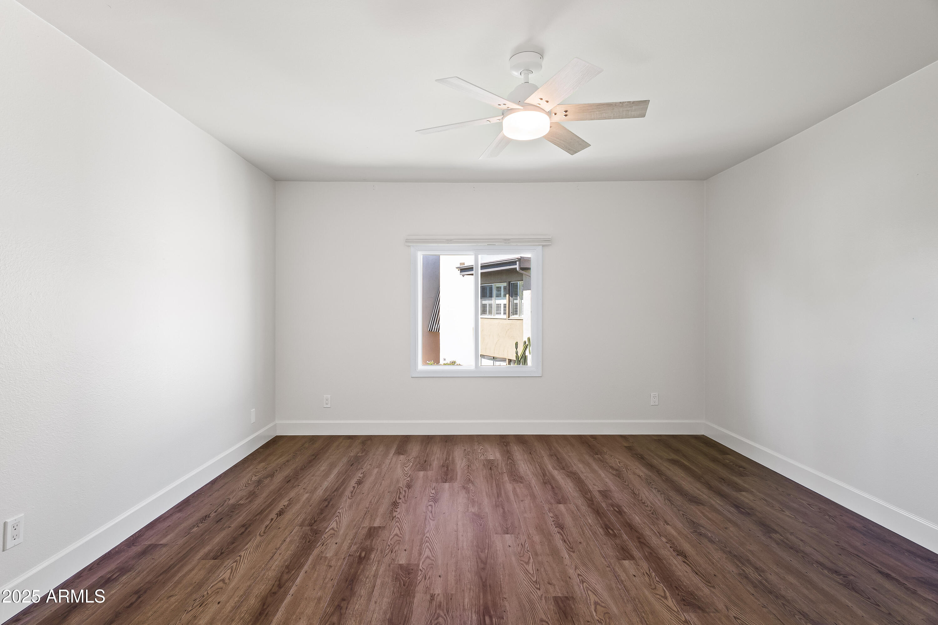 4201 East Camelback Road, Unit 100 Phoenix, AZ 85018 - Photo 17 of 24 Primary Bedroom