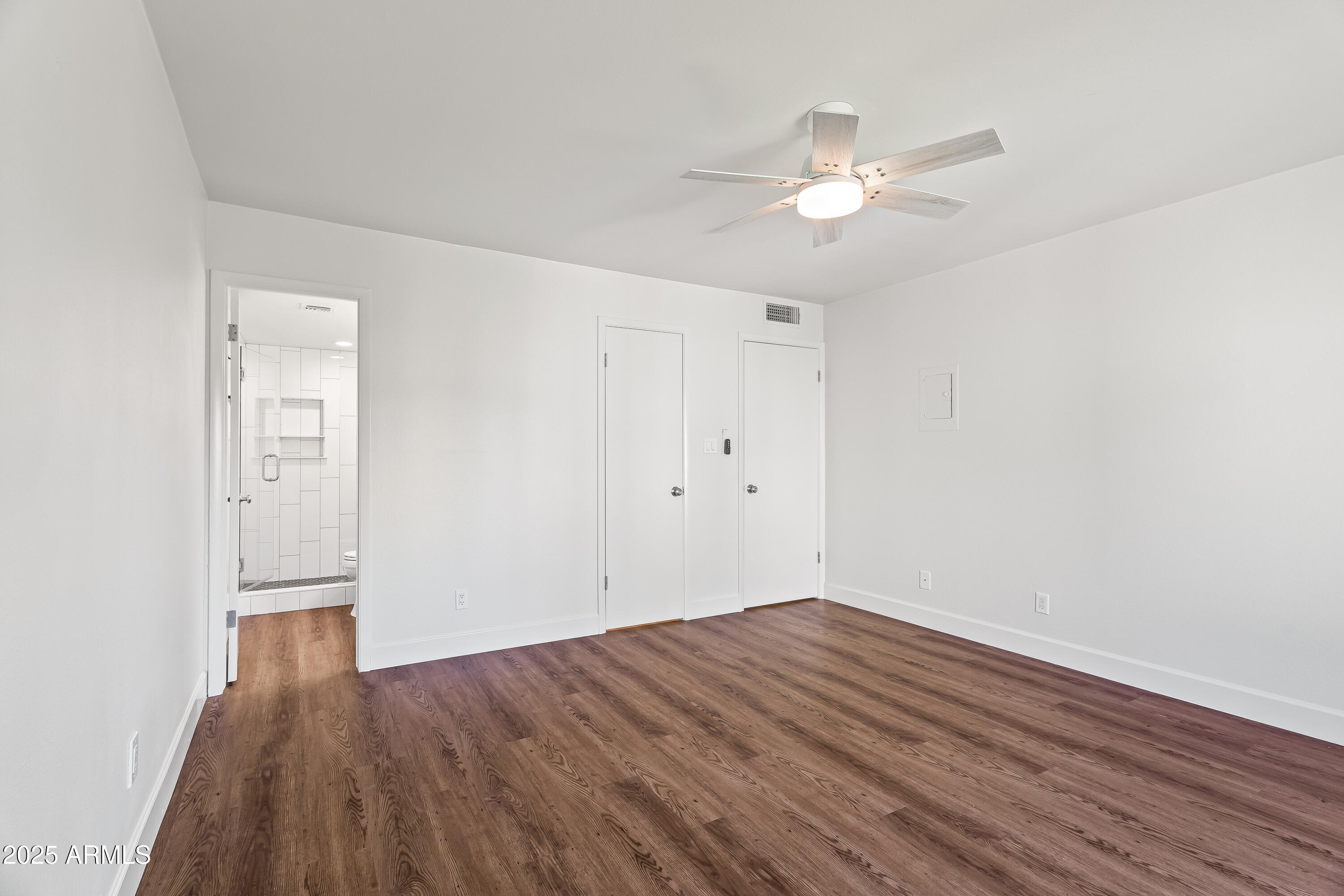 4201 East Camelback Road, Unit 100 Phoenix, AZ 85018 - Photo 19 of 24 Primary Bedroom