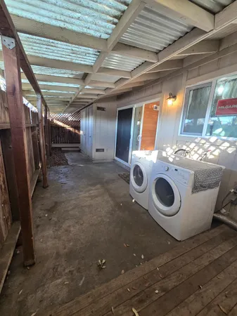 a utility room with dryer and washer