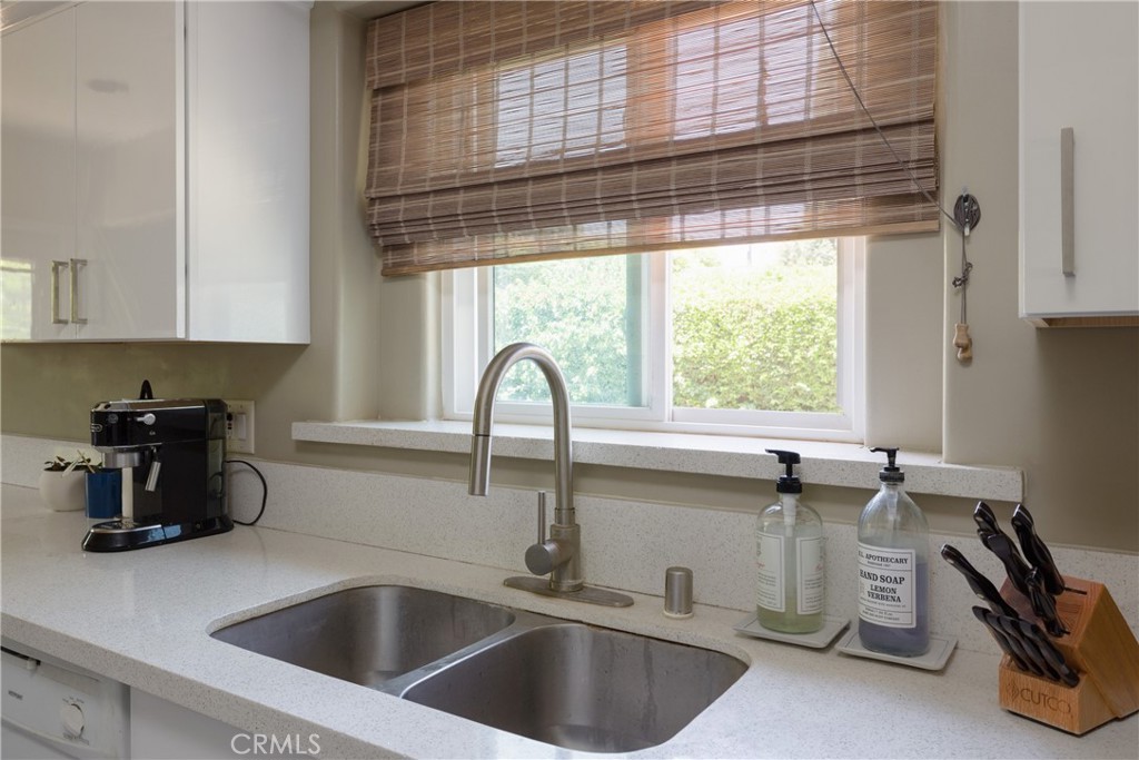 620 Beverly Drive Arcadia, CA 91006 - Photo 12 of 29 a kitchen with a sink a counter and a window