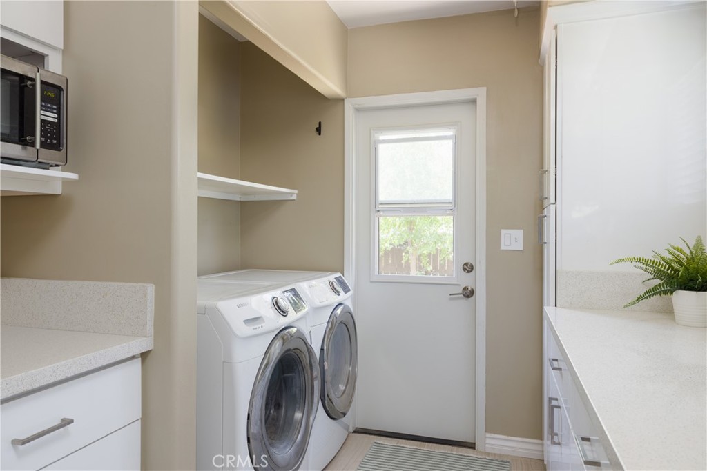 620 Beverly Drive Arcadia, CA 91006 - Photo 13 of 29 a utility room with dryer and washer