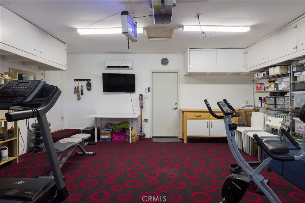 620 Beverly Drive Arcadia, CA 91006 - Photo 22 of 29 a living room with furniture a flat screen tv and a fireplace