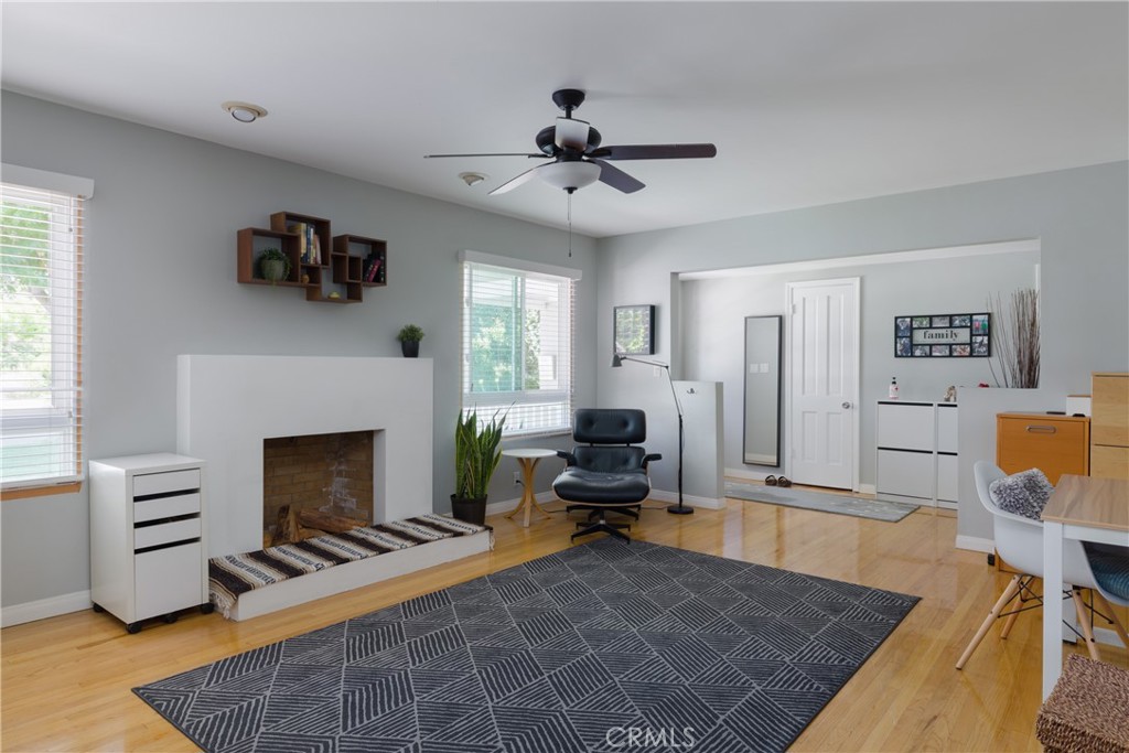 620 Beverly Drive Arcadia, CA 91006 - Photo 4 of 29 a living room with furniture and a fireplace