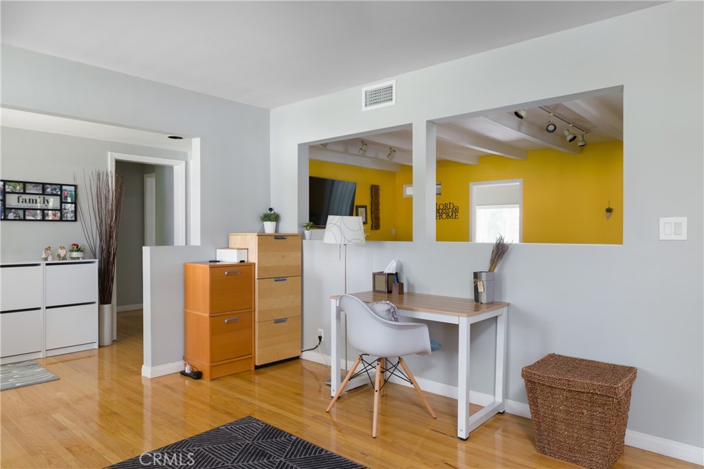 620 Beverly Drive Arcadia, CA 91006 - Photo 7 of 29 a workspace with furniture and wooden floor