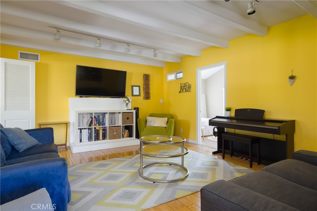 620 Beverly Drive Arcadia, CA 91006 - Photo 8 of 29 a living room with furniture and a flat screen tv