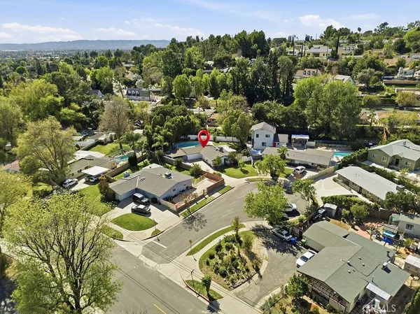 an aerial view of a city with lots of residential buildings