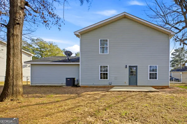 a house view with a outdoor space