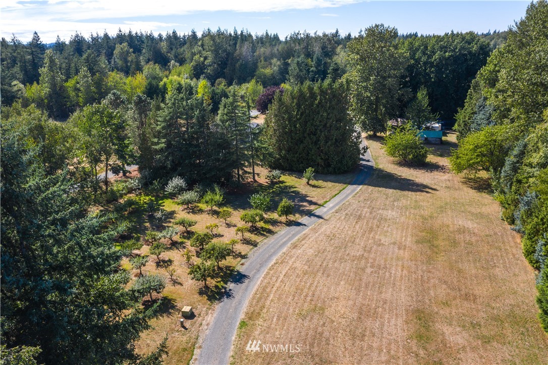 7592 Woodland Road Ferndale, WA 98248 - Photo 30 of 38 a view of a backyard