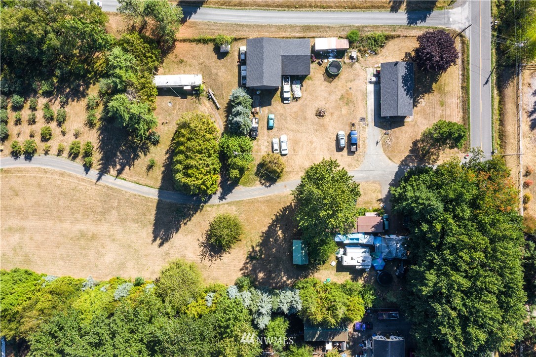 7592 Woodland Road Ferndale, WA 98248 - Photo 35 of 38 an aerial view of residential houses with outdoor space