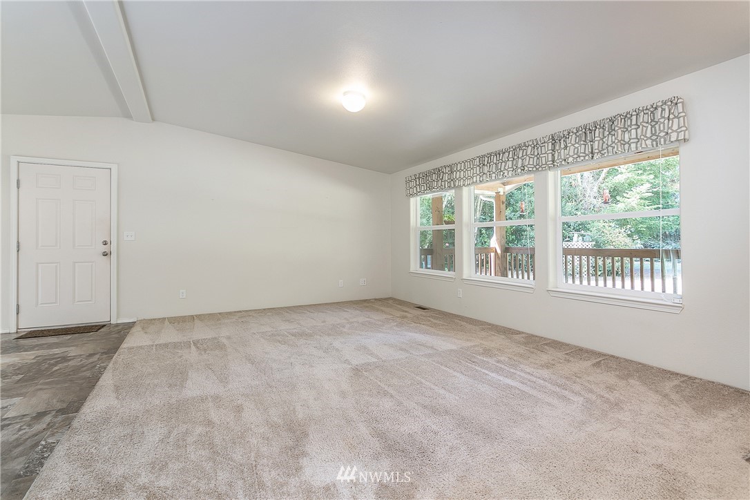 7592 Woodland Road Ferndale, WA 98248 - Photo 8 of 38 an empty room with a window