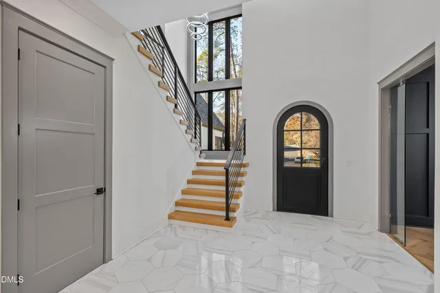 a kitchen with cabinets and shelf