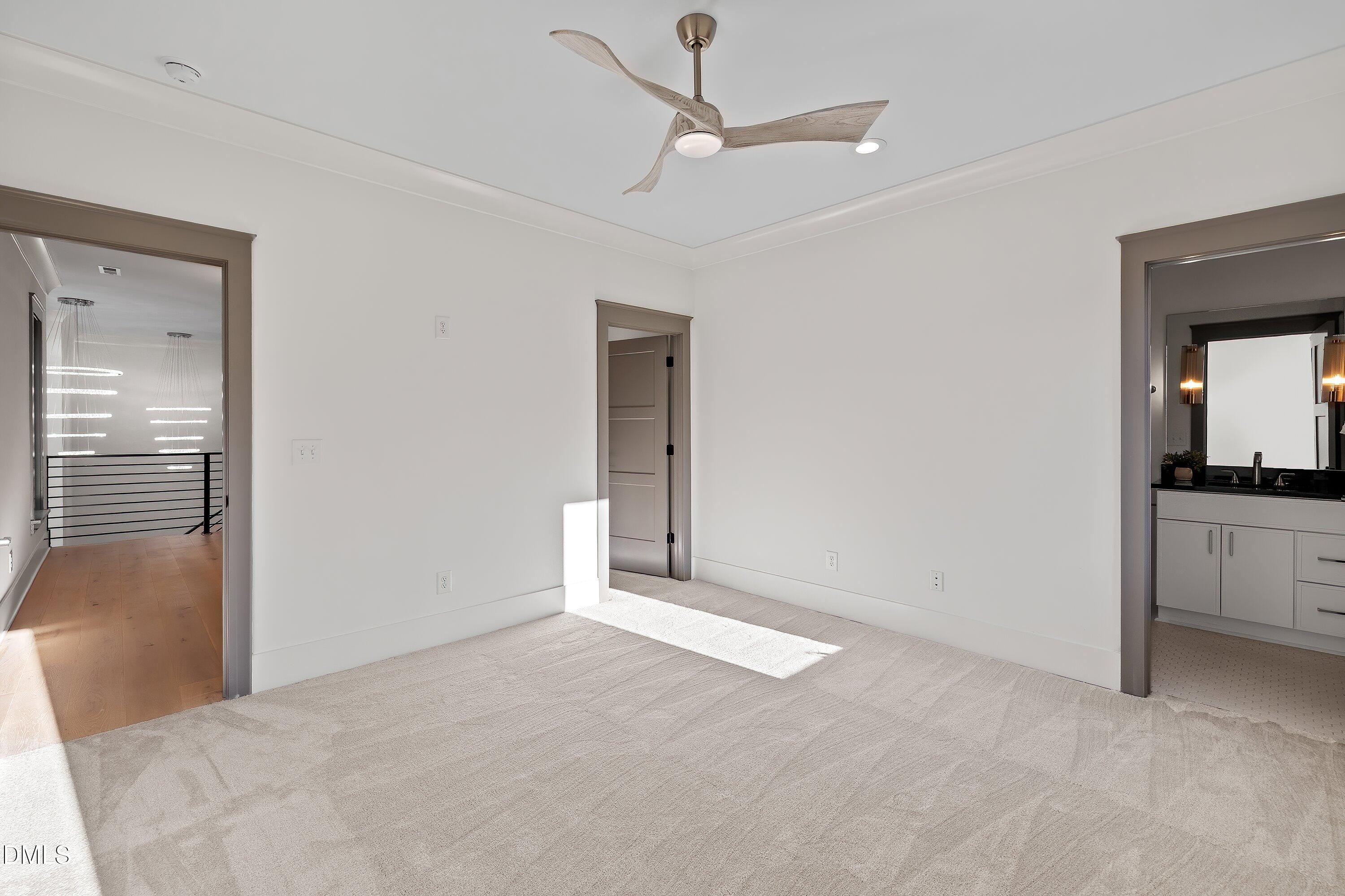 1312 Hunting Ridge Road Raleigh, NC 27615 - Photo 71 of 95 a view of a big room with closet and windows