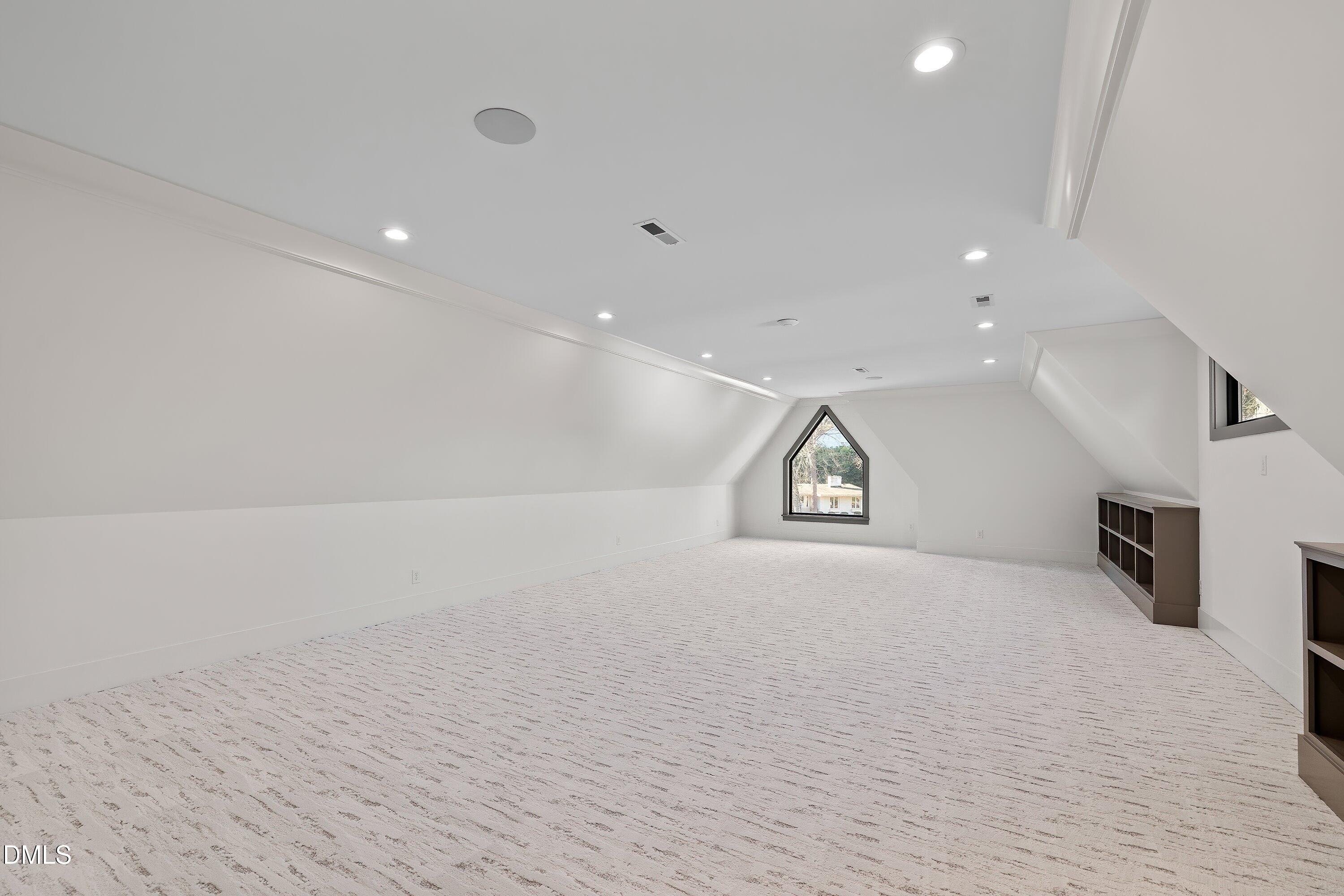 1312 Hunting Ridge Road Raleigh, NC 27615 - Photo 74 of 95 wooden floor in an empty room with a window