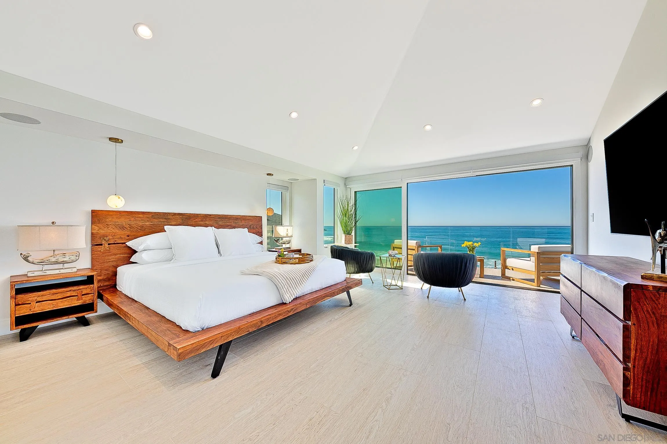 303 Sea Lane La Jolla, CA 92037 - Photo 20 of 61 a bedroom with furniture and a flat screen tv