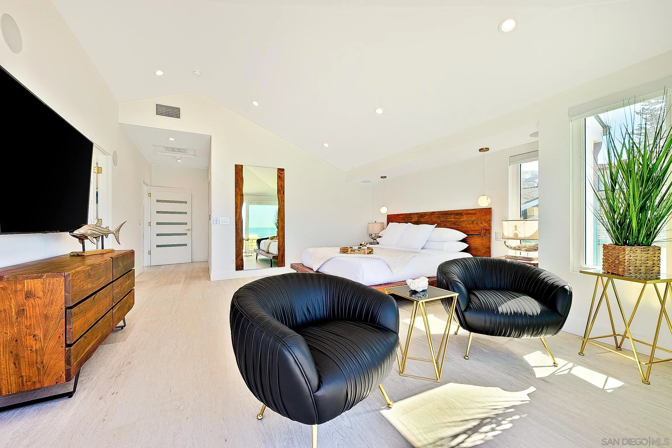 303 Sea Lane La Jolla, CA 92037 - Photo 21 of 61 a bedroom with furniture and a flat screen tv