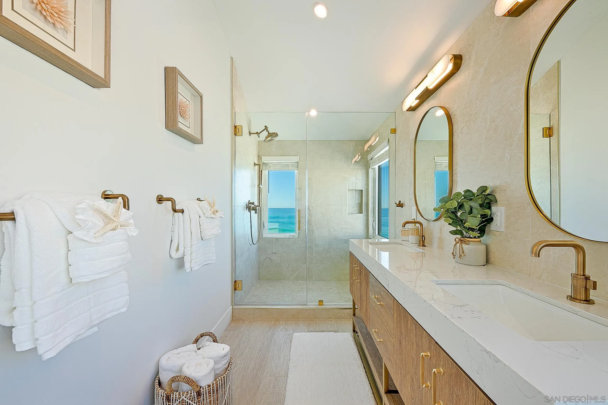 303 Sea Lane La Jolla, CA 92037 - Photo 24 of 61 a bathroom with a sink a toilet and shower