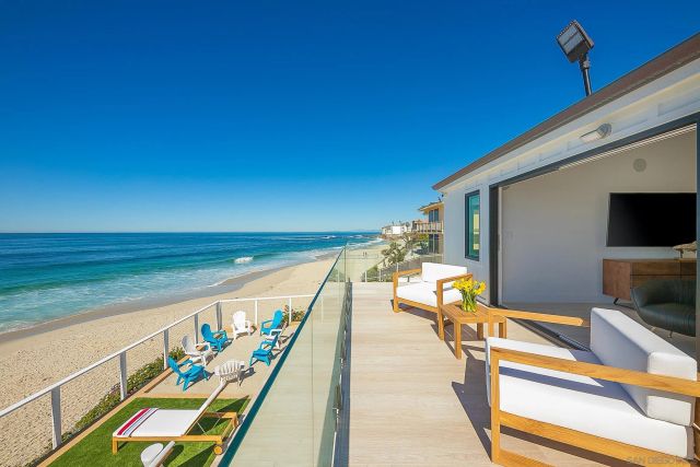 a bed room with a bed and a television