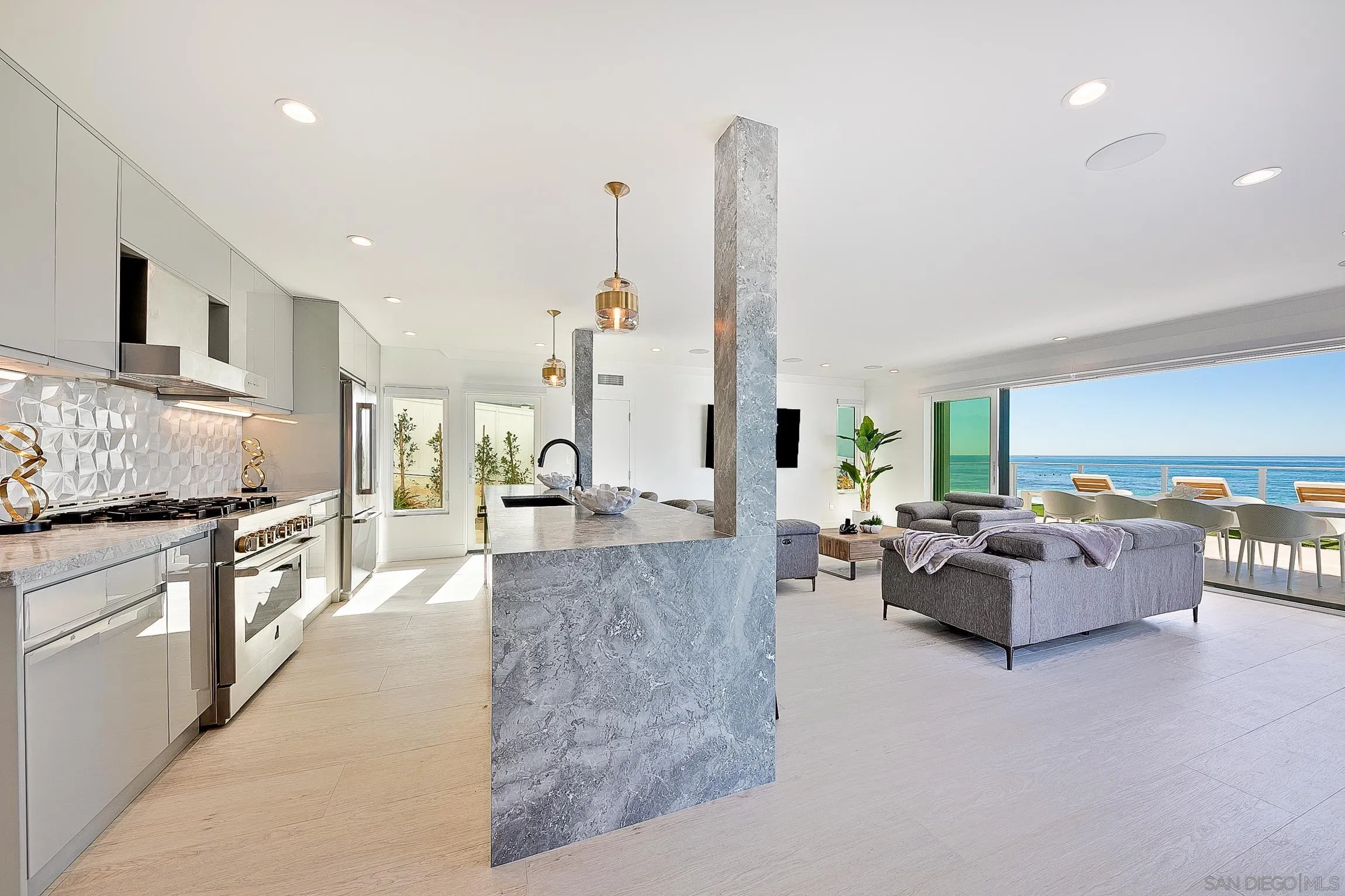 303 Sea Lane La Jolla, CA 92037 - Photo 41 of 61 a living room with furniture and a kitchen view