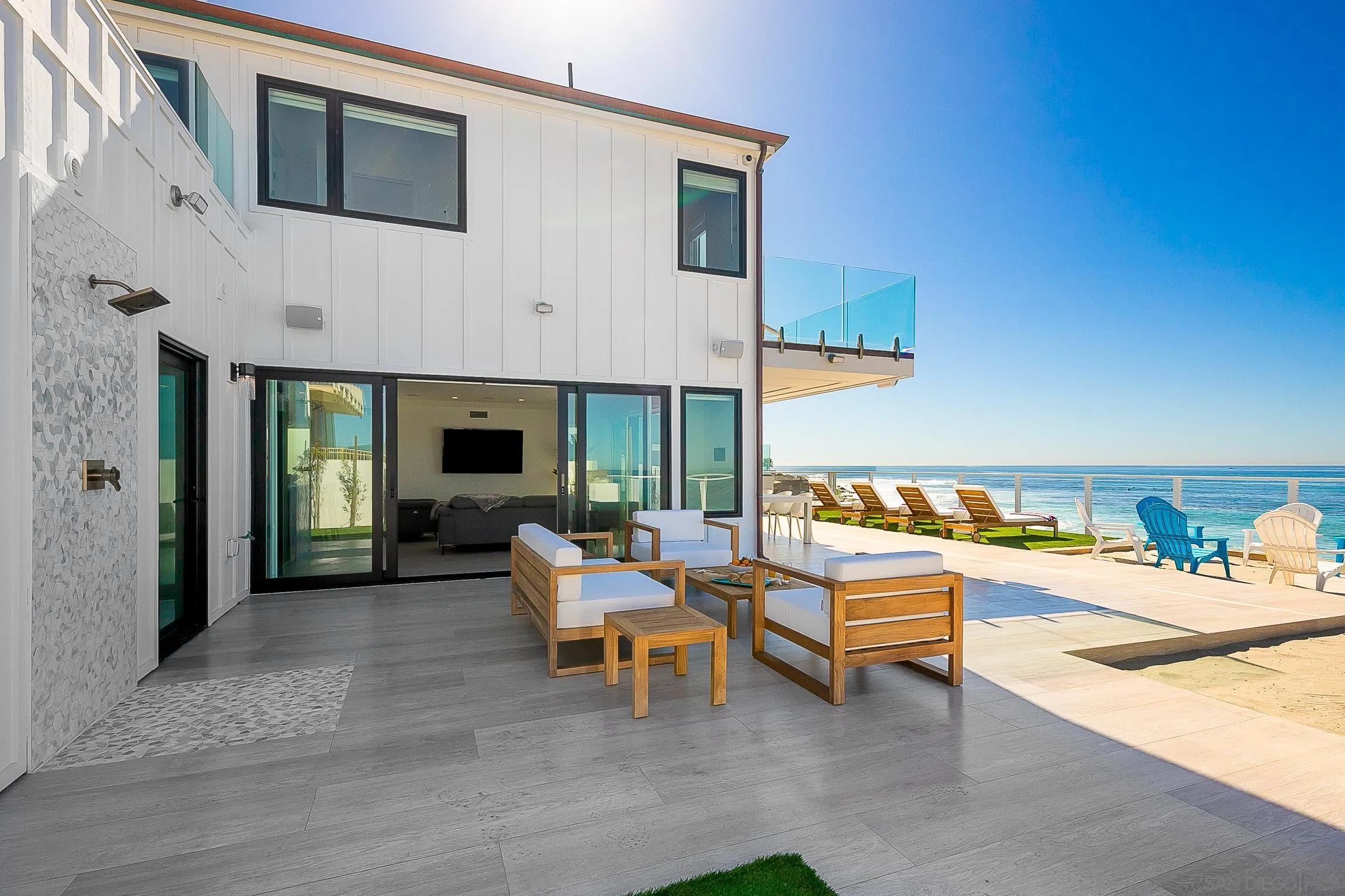 303 Sea Lane La Jolla, CA 92037 - Photo 47 of 61 a outdoor space with patio the couches and a fireplace