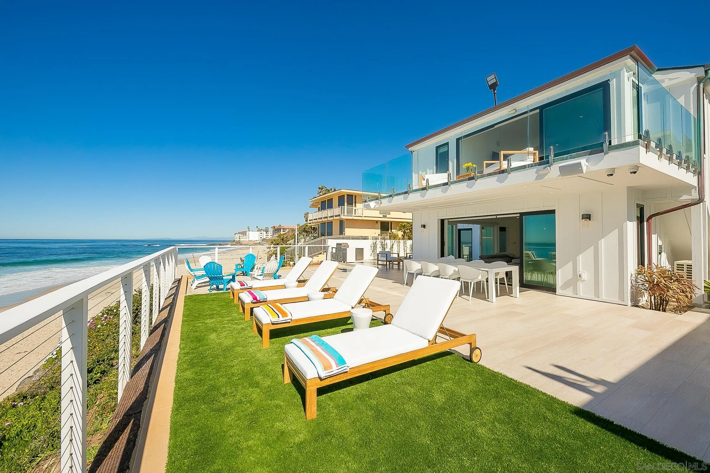 303 Sea Lane La Jolla, CA 92037 - Photo 52 of 61 a view of a house with backyard porch and furniture