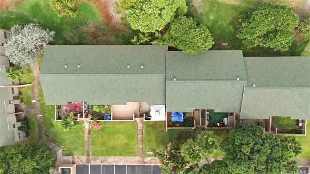 an aerial view of a house having yard