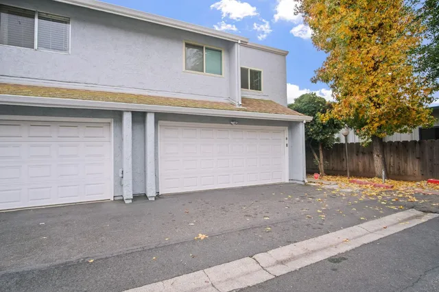 a house with trees in front of it