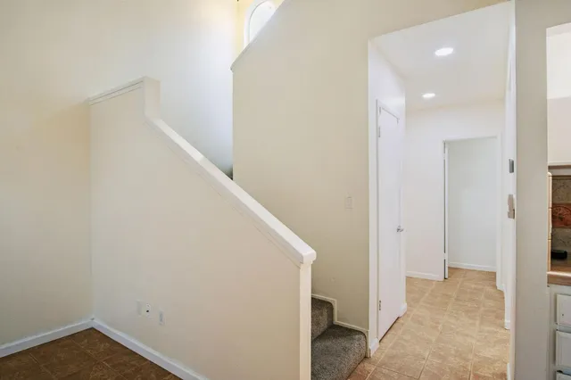 a view of a hallway with closet
