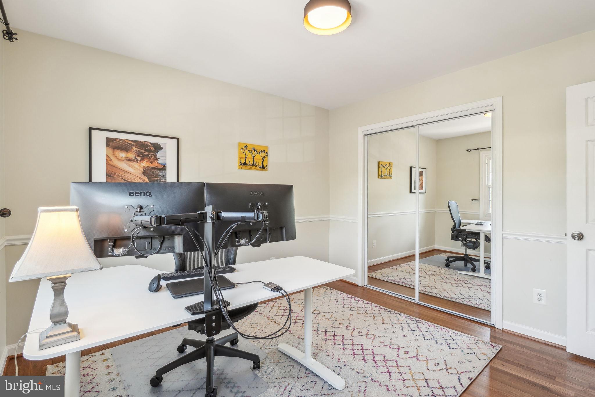 8248 Carrleigh Parkway Springfield, VA 22152 - Photo 23 of 45 a view of a livingroom with furniture and a couch