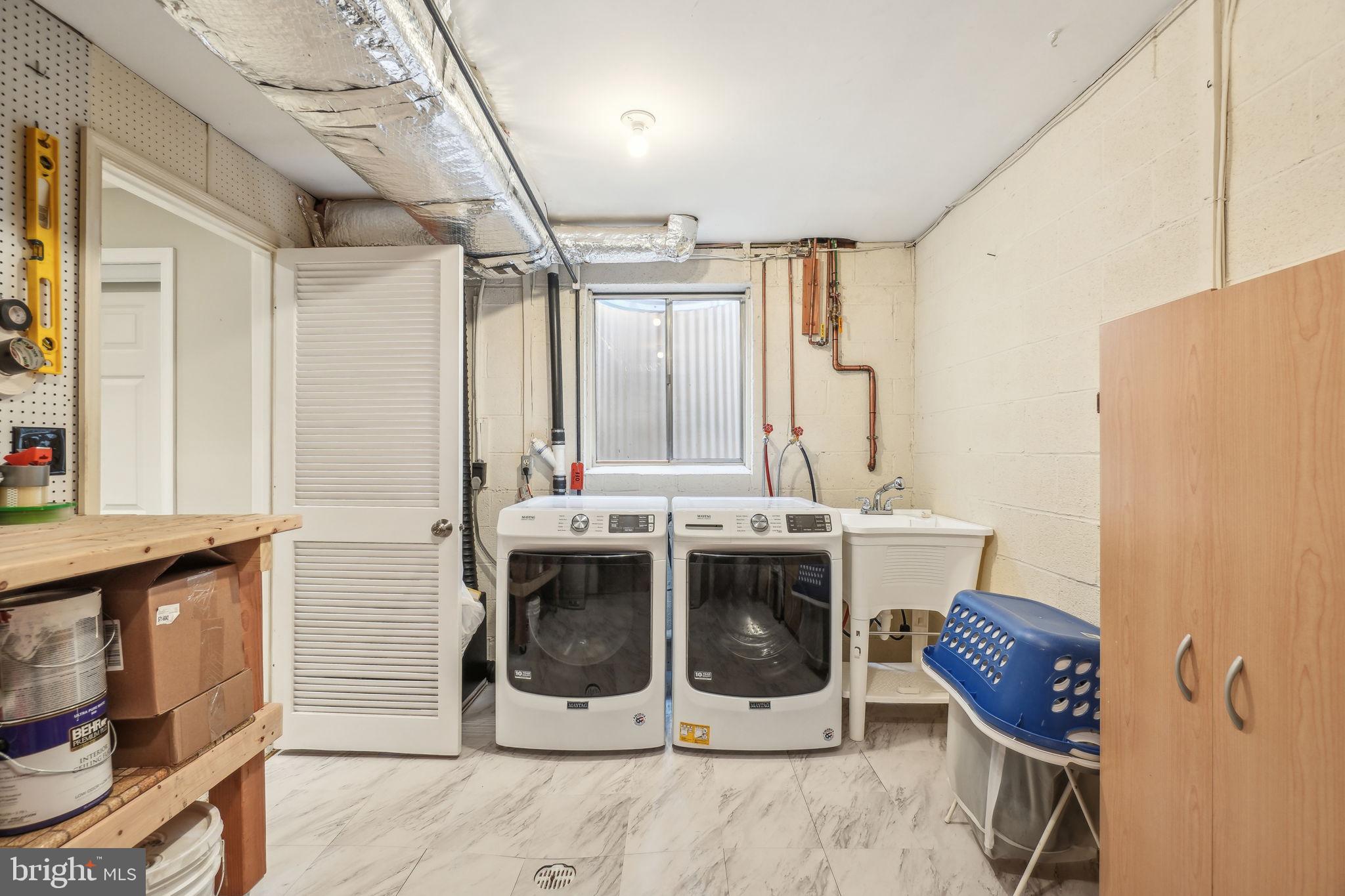 8248 Carrleigh Parkway Springfield, VA 22152 - Photo 30 of 45 a view of entryway with furniture and chandelier