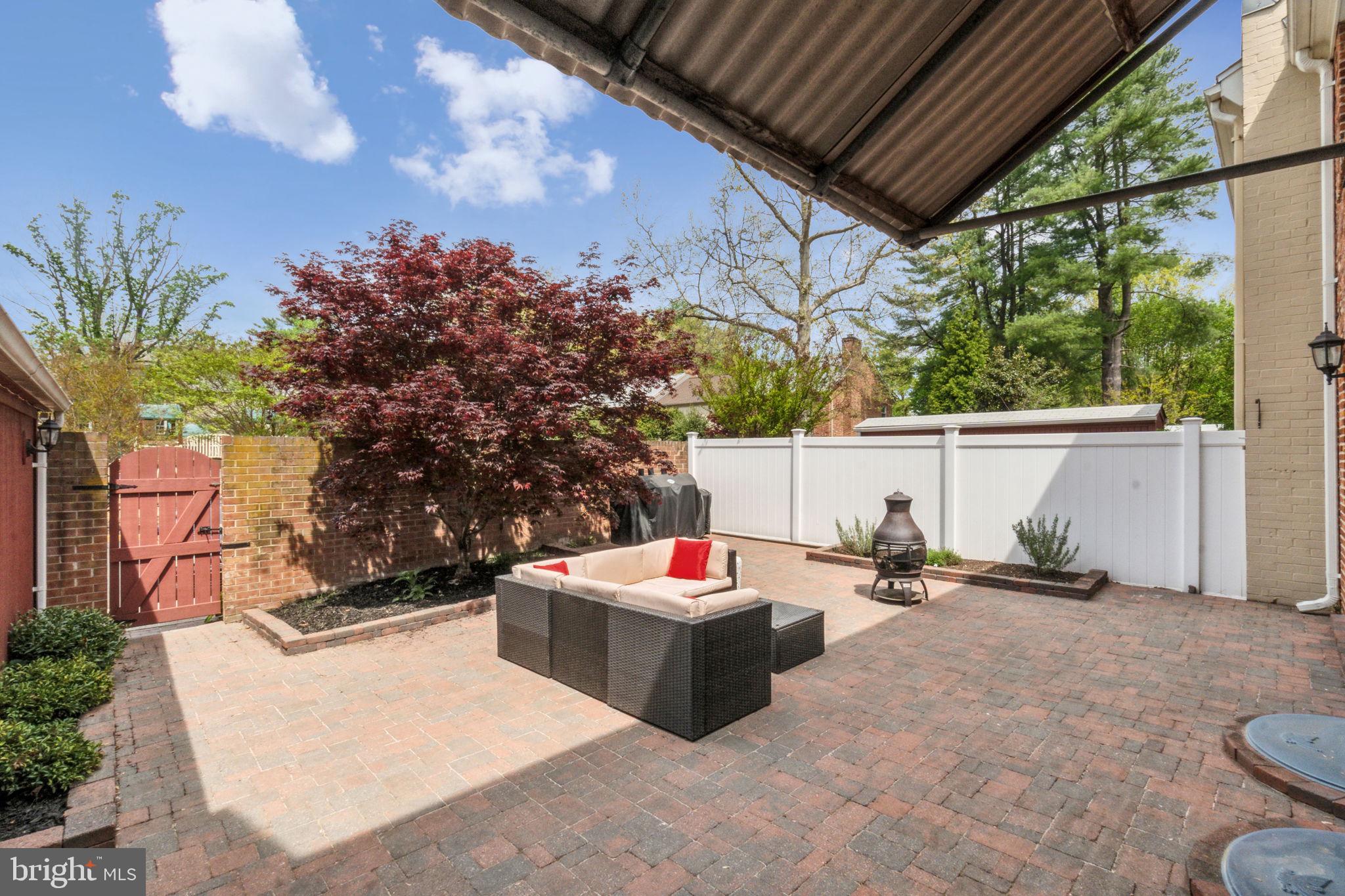 8248 Carrleigh Parkway Springfield, VA 22152 - Photo 32 of 45 a outdoor space with patio furniture