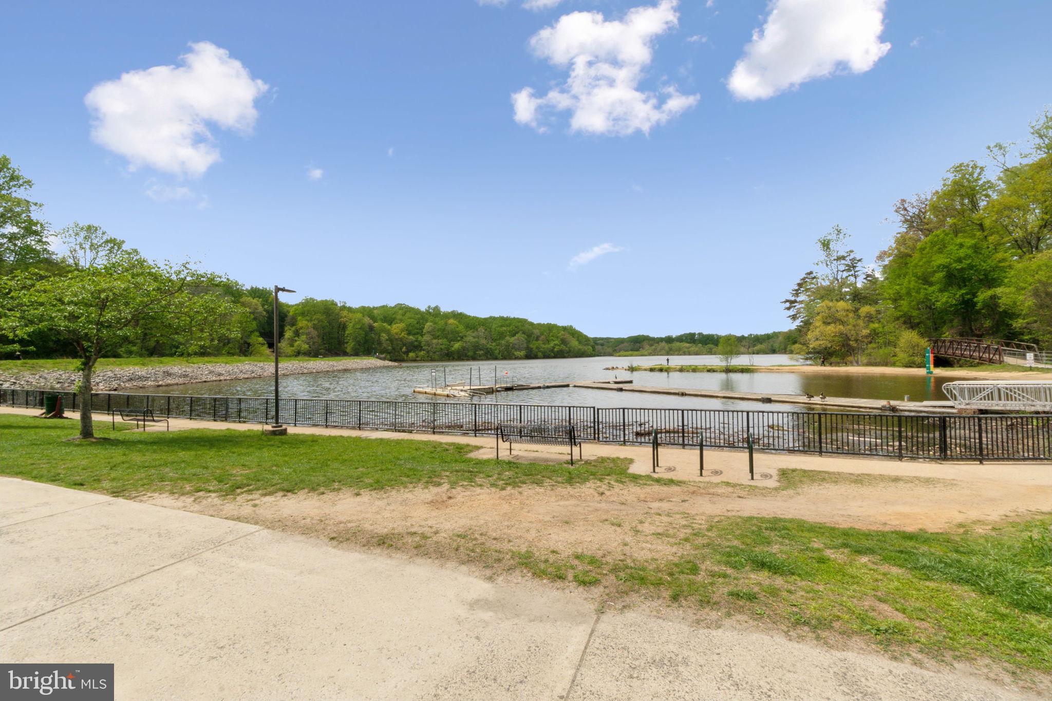 8248 Carrleigh Parkway Springfield, VA 22152 - Photo 40 of 45 a view of a swimming pool with a yard