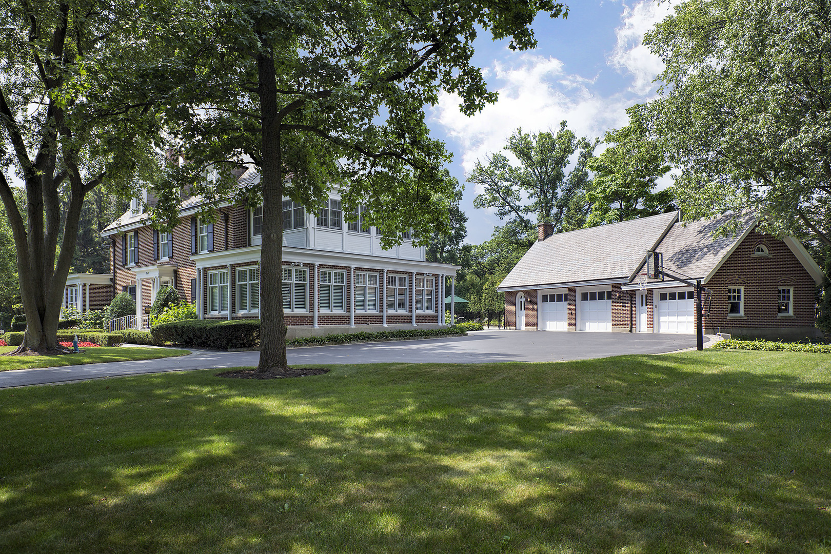 360 Palos Road Glencoe, IL 60022 - Photo 20 of 25 a view of a house with a yard