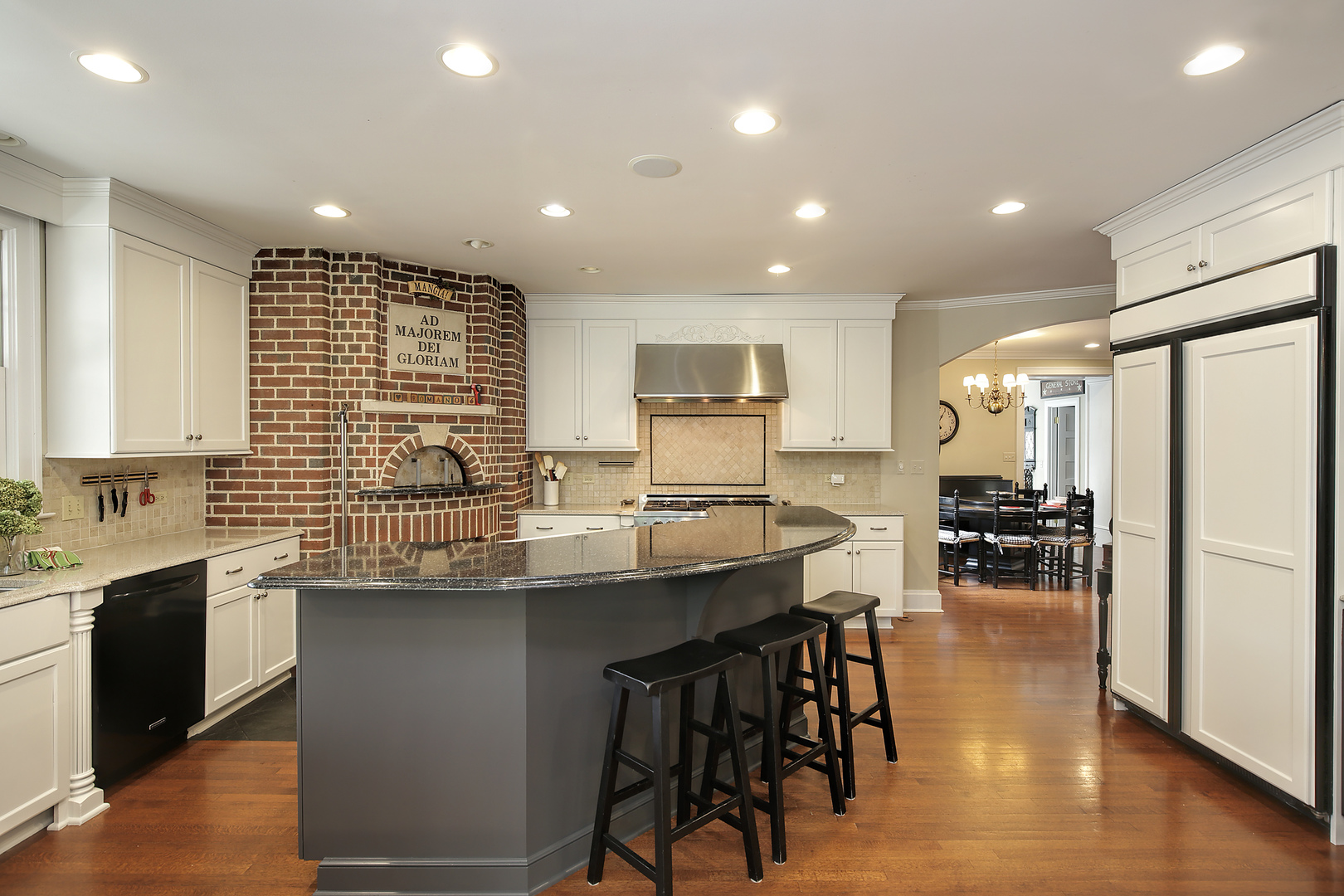 360 Palos Road Glencoe, IL 60022 - Photo 10 of 25 a kitchen with stainless steel appliances granite countertop counter space a sink and a refrigerator